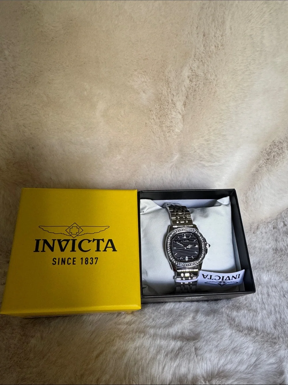Invicta Silver Watch with Black Dial and Crystal Bezel